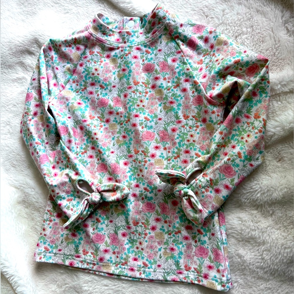 Minnow rashguard top.